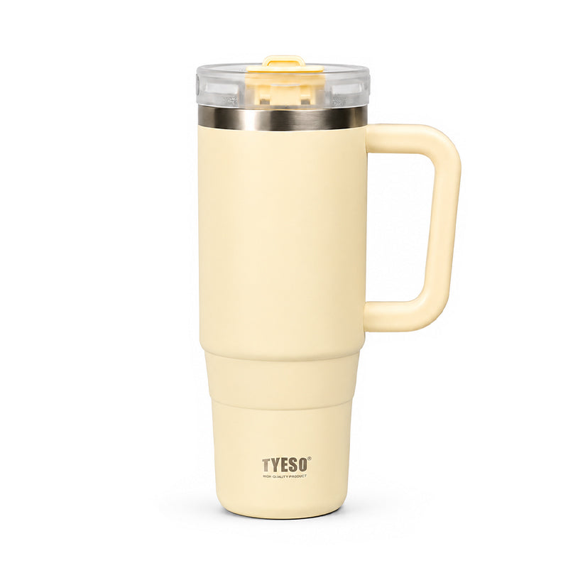 Ceramic tumbler with handle, TYESO logo, clear lid and metal rim, cream yellow
