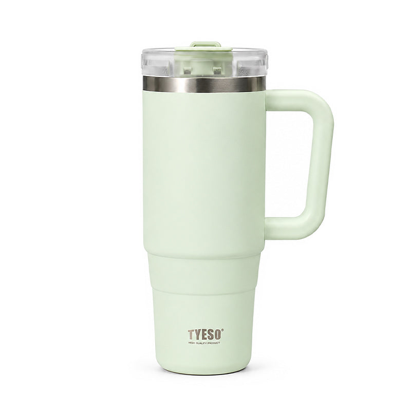 Pale mint ceramic tumbler with clear lid and side handle