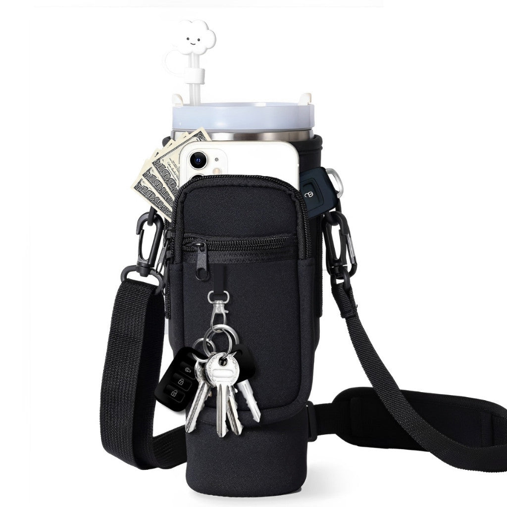 Black tumbler sleeve with front pocket, zipper, key fob, and crossbody strap
