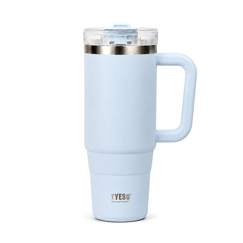 Light blue ceramic tumbler with side handle and clear lid